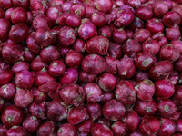 Onions are kept for sale at a market in Srinagar, Jammu and Kashmir, on December 14, 2024. (