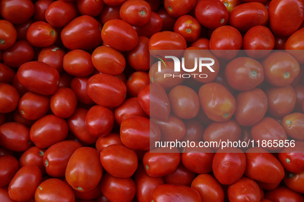 Tomatoes are kept for sale at a market in Srinagar, Jammu and Kashmir, on December 14, 2024. 