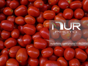 Tomatoes are kept for sale at a market in Srinagar, Jammu and Kashmir, on December 14, 2024. (