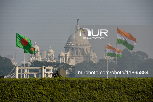 Indian and Bangladesh flags are seen in Kolkata, India, on December 14, 2024, ahead of practice for the Vijay Diwas celebration by the armed...