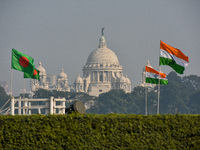 Indian and Bangladesh flags are seen in Kolkata, India, on December 14, 2024, ahead of practice for the Vijay Diwas celebration by the armed...