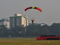 Paratroopers of the Indian Army perform a drop to showcase to the public during the Vijay Diwas celebration, as seen in Kolkata, India, on D...