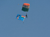 Paratroopers of the Indian Army perform a drop to showcase to the public during the Vijay Diwas celebration, as seen in Kolkata, India, on D...