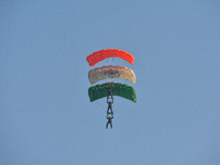 Paratroopers of the Indian Army perform a drop to showcase to the public during the Vijay Diwas celebration, as seen in Kolkata, India, on D...