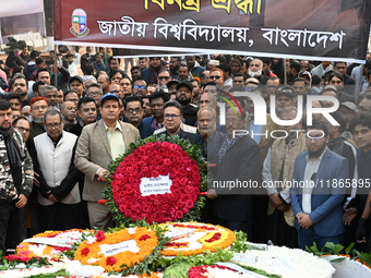 People Are Gathering To Pay Tribute To The Martyred Intellectuals At The Martyred Intellectuals Memorial At Mirpur In Dhaka, Bangladesh, On...