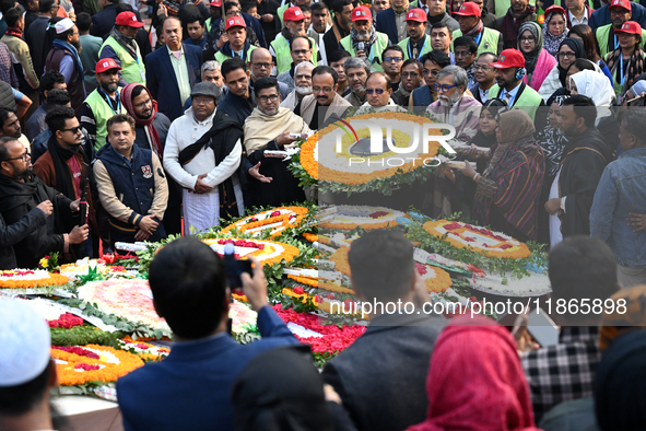 People Are Gathering To Pay Tribute To The Martyred Intellectuals At The Martyred Intellectuals Memorial At Mirpur In Dhaka, Bangladesh, On...