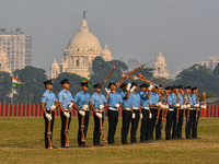 Officers of the Indian Air Force perform stunts with rifles during a practice ahead of the Vijay Diwas celebration in Kolkata, India, on Dec...