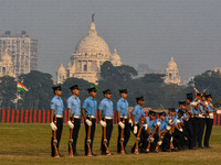 Officers of the Indian Air Force perform stunts with rifles during a practice ahead of the Vijay Diwas celebration in Kolkata, India, on Dec...