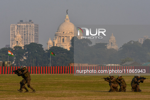 Soldiers participate in a practice display ahead of the Vijay Diwas celebration in Kolkata, India, on December 14, 2024. 'Vijay Diwas' is ce...