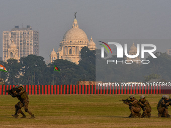 Soldiers participate in a practice display ahead of the Vijay Diwas celebration in Kolkata, India, on December 14, 2024. 'Vijay Diwas' is ce...