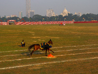 Soldiers of the armed forces perform acrobatic stunts on horses during practice for the Vijay Diwas celebration, as seen in Kolkata, India,...