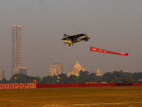 Indian army planes display maneuvers during a practice ahead of the Vijay Diwas celebration in Kolkata, India, on December 14, 2024. (