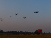 Indian army helicopters display maneuvers during a practice ahead of the Vijay Diwas celebration in Kolkata, India, on December 14, 2024. (