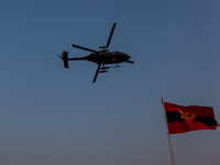 Indian army helicopters display maneuvers during a practice ahead of the Vijay Diwas celebration in Kolkata, India, on December 14, 2024. (