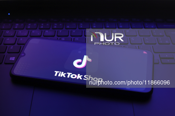 The TikTok Shop logo appears on the screen of a smartphone in Reno, United States, on December 14, 2024. (Photo Illustration by Jaque Silva/...