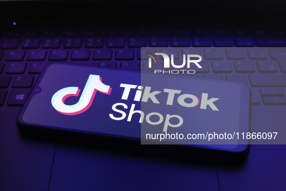 The TikTok Shop logo appears on the screen of a smartphone in Reno, United States, on December 14, 2024. (Photo Illustration by Jaque Silva/...