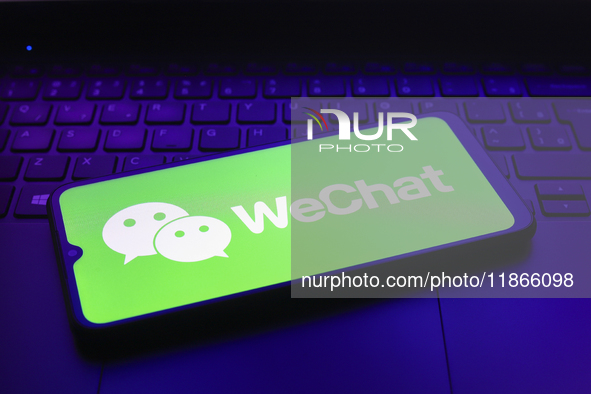 The WeChat logo appears on the screen of a smartphone in Reno, United States, on December 14, 2024. (Photo Illustration by Jaque Silva/NurPh...