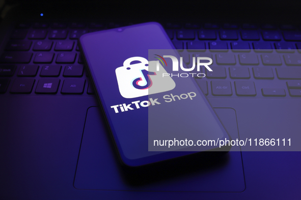 The TikTok Shop logo appears on the screen of a smartphone in Reno, United States, on December 14, 2024. (Photo Illustration by Jaque Silva/...