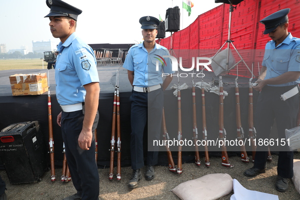 Indian Airforce personnel wait before performing a drill during the full dress rehearsal ahead of ''Vijay Diwas,'' a ceremony to celebrate t...