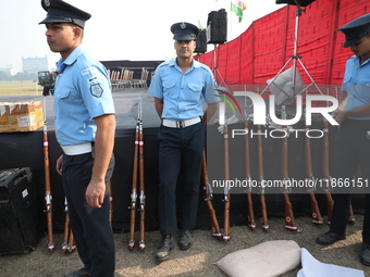 Indian Airforce personnel wait before performing a drill during the full dress rehearsal ahead of ''Vijay Diwas,'' a ceremony to celebrate t...