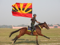 An Indian army soldier demonstrates his skills with his horse during the full dress rehearsal ahead of ''Vijay Diwas,'' a ceremony to celebr...