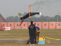 An Indian army soldier performs a stunt during the full dress rehearsal ahead of ''Vijay Diwas,'' a ceremony to celebrate the liberation of...