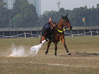 An Indian army soldier demonstrates his skills with his horse during the full dress rehearsal ahead of ''Vijay Diwas'', a ceremony to celebr...