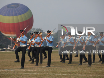 The Indian Air Force (IAF) officers perform a drill during the full dress rehearsal ahead of ''Vijay Diwas,'' a ceremony to celebrate the li...