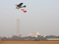 A plane flies past the iconic Victoria Memorial during the full dress rehearsal ahead of ''Vijay Diwas,'' a ceremony to celebrate the libera...