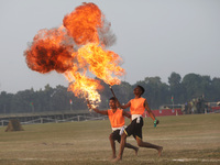 Indian army soldiers blow fire from their mouths as they perform during the full dress rehearsal ahead of ''Vijay Diwas,'' a ceremony to cel...