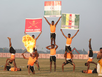 Indian army soldiers perform a stunt during the full dress rehearsal ahead of ''Vijay Diwas,'' a ceremony to celebrate the liberation of Ban...