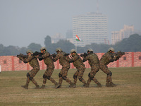 Indian army soldiers demonstrate their skills during the full dress rehearsal ahead of ''Vijay Diwas,'' a ceremony to celebrate the liberati...