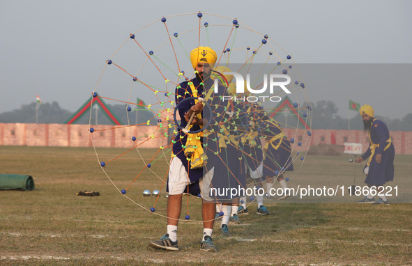 Indian army soldiers perform during the full dress rehearsal ahead of ''Vijay Diwas'', a ceremony that celebrates the liberation of Banglade...