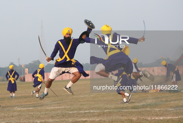 Indian army soldiers perform during the full dress rehearsal ahead of ''Vijay Diwas'', a ceremony that celebrates the liberation of Banglade...