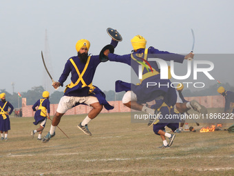 Indian army soldiers perform during the full dress rehearsal ahead of ''Vijay Diwas'', a ceremony that celebrates the liberation of Banglade...