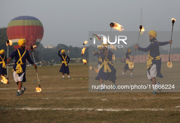 Indian army soldiers perform during the full dress rehearsal ahead of ''Vijay Diwas'', a ceremony that celebrates the liberation of Banglade...