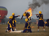 An Indian army soldier performs a stunt during the full dress rehearsal ahead of ''Vijay Diwas,'' a ceremony to celebrate the liberation of...