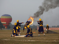 An Indian army soldier performs a stunt during the full dress rehearsal ahead of ''Vijay Diwas,'' a ceremony to celebrate the liberation of...