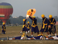 An Indian army soldier performs a stunt during the full dress rehearsal ahead of ''Vijay Diwas,'' a ceremony to celebrate the liberation of...