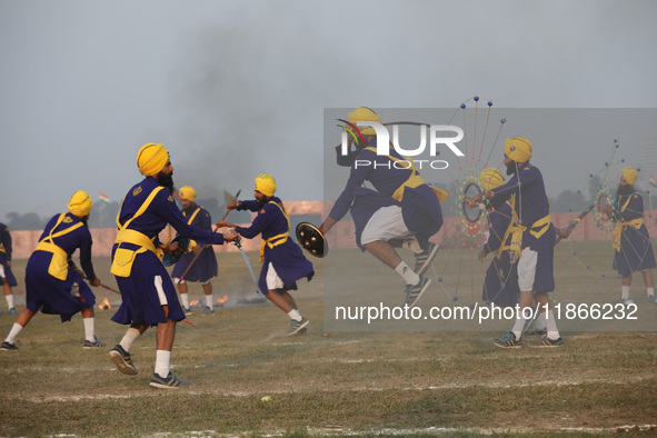 Indian army soldiers perform during the full dress rehearsal ahead of ''Vijay Diwas'', a ceremony that celebrates the liberation of Banglade...