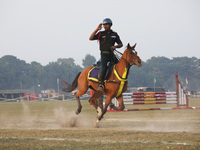 An Indian army soldier demonstrates his skills with his horse during the full dress rehearsal ahead of ''Vijay Diwas,'' a ceremony to celebr...