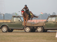 An Indian army soldier demonstrates skills with a horse during the full dress rehearsal ahead of ''Vijay Diwas,'' a ceremony to celebrate th...