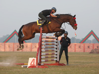 An Indian army soldier demonstrates his skills with his horse during the full dress rehearsal ahead of ''Vijay Diwas,'' a ceremony to celebr...