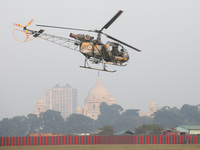 Indian army soldiers demonstrate their skills with a helicopter during the full dress rehearsal ahead of ''Vijay Diwas,'' a ceremony to cele...