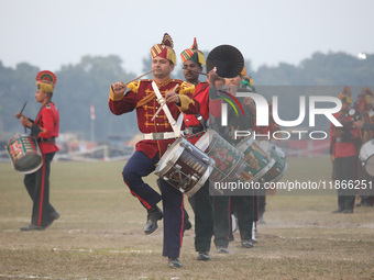 The Indian army band performs during the full dress rehearsal ahead of ''Vijay Diwas,'' a ceremony to celebrate the liberation of Bangladesh...