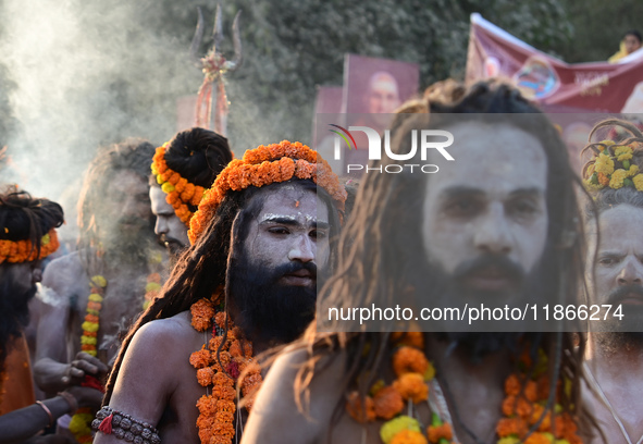 Hindu sadhus (holy men) from the Juna Akhara take part in a religious procession towards the Sangam area during the first entry for the Maha...