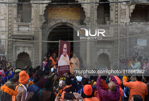 Hindu sadhus (holy men) from the Juna Akhara take part in a religious procession towards the Sangam area during the first entry for the Maha...