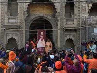 Hindu sadhus (holy men) from the Juna Akhara take part in a religious procession towards the Sangam area during the first entry for the Maha...