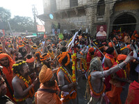 Hindu sadhus (holy men) from the Juna Akhara take part in a religious procession towards the Sangam area during the first entry for the Maha...