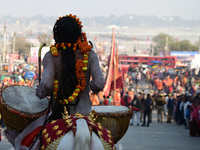 Hindu sadhus (holy men) from the Juna Akhara take part in a religious procession towards the Sangam area during the first entry for the Maha...